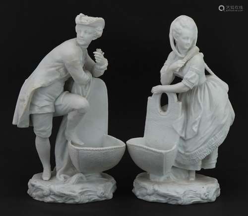 Pair of bisque porcelain figural salts in the style of Chels...