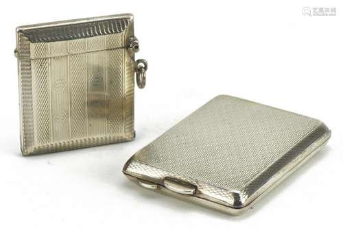 Art Deco silver vesta with engine turned decoration and a si...