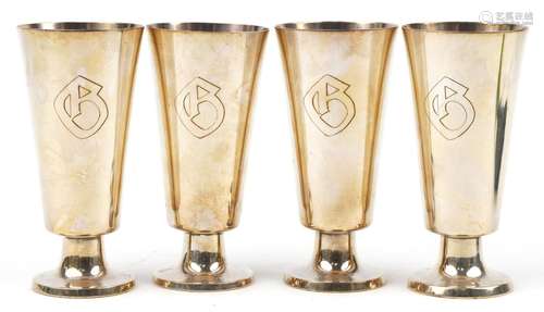 WMF, set of four German silver plated wine chalices with eng...