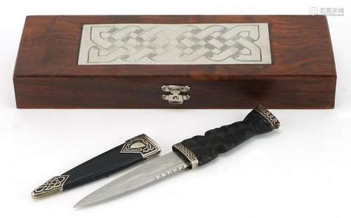 Scottish sgian dubh with carved wood knot design handle, sil...