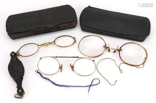 Three pairs of early 20th century spectacles comprising one ...