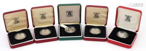 Five United Kingdom silver proof one pound coins by The Roya...
