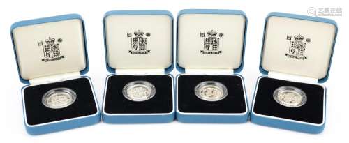 Four United Kingdom silver proof one pound coins by The Roya...