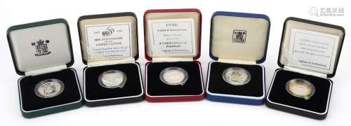 Five United Kingdom silver proof two pound coins with certif...