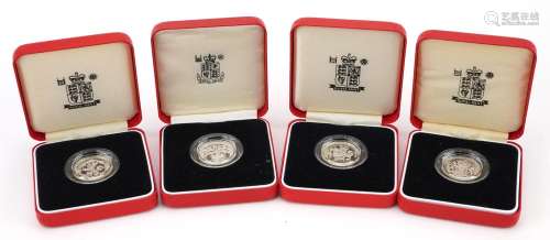 Four United Kingdom silver proof piedfort one pound coins by...