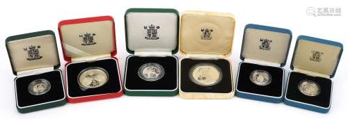 Five United Kingdom silver proof coins by The Royal Mint wit...