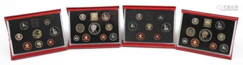 Four United Kingdom deluxe proof coin collections by The Roy...
