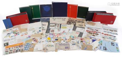 Large collection of stamps arranged in albums, stock books a...