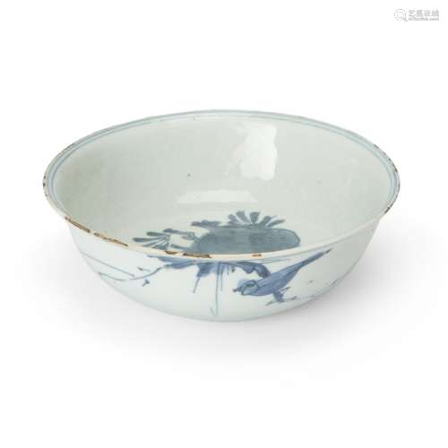 A Chinese blue and white 'pomegranate' carved shallow bowl<b...