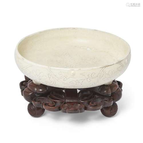 An unusual Chinese Cizhou-type 'lotus' tripod narcissus bowl...