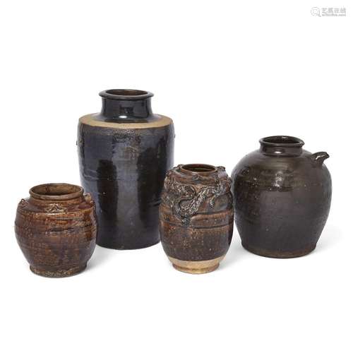 Four large Chinese and Sawankhalok black-glazed vessels<br /...