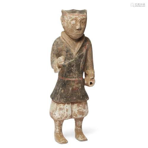 A large Chinese pottery figure of a warrior<br />
<br />
Han...