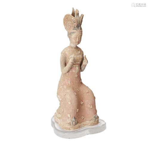 A large Chinese pottery figure of a court lady<br />
<br />
...