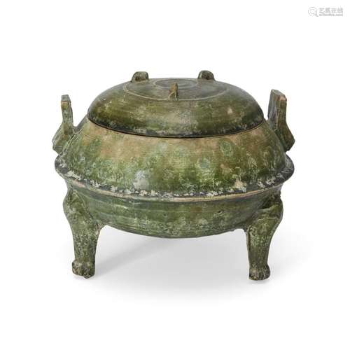 A Chinese green-glazed tripod ding and cover<br />
<br />
Ha...