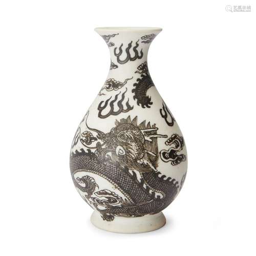 A small Chinese biscuit porcelain 'dragon' pear-shaped vase,...