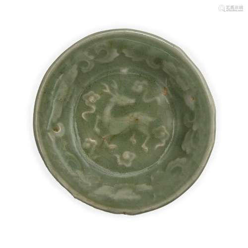 A small Chinese celadon-glazed moulded 'deer' dish<br />
<br...