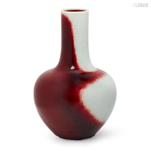A Chinese monochrome red glazed bottle vase<br />
<br />
Rep...