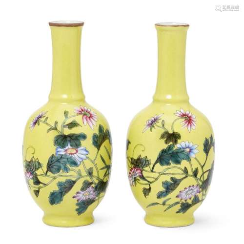 A pair of Chinese small lemon-yellow-ground famille rose 'fl...