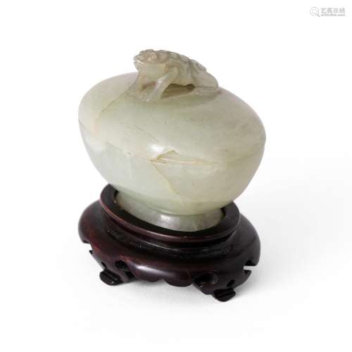 A pale green jade carved 'toad' box and cover<br />
<br />
L...