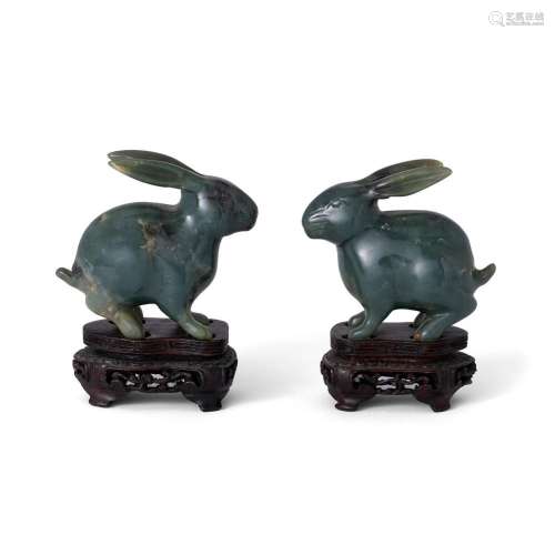 A pair of Chinese hardstone rabbits with stands<br />
<br />...