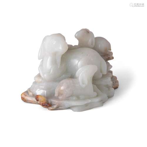 A Chinese pale and russet jade 'sanyang' group<br />
<br />
...