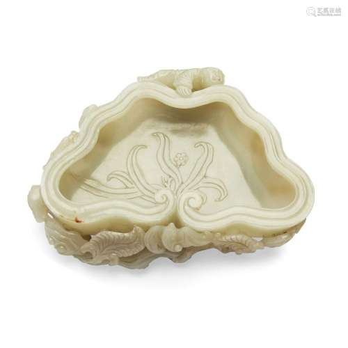 A Chinese pale green jade 'lingzhi' brushwasher<br />
<br />...