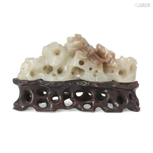 A Chinese reticulated jade brush rest<br />
<br />
Late Qing...
