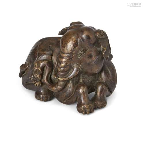 A large Chinese bronze 'elephant' scroll weight<br />
<br />...
