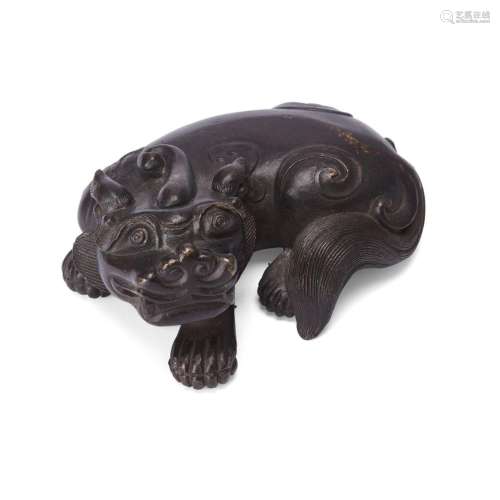 A Chinese bronze 'bixie' scroll weight<br />
<br />
Qing dyn...