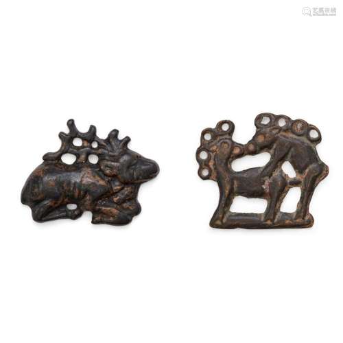A Chinese and a Scythian animal bronze plaque<br />
<br />
6...