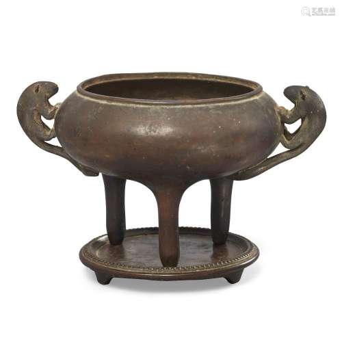 A Chinese bronze tripod censer and stand<br />
<br />
Qing d...