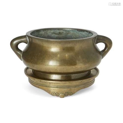 A Chinese bronze incense burner and stand<br />
<br />
Qing ...