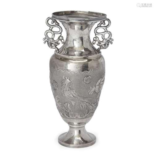A Chinese silver 'phoenix and peony' baluster vase<br />
<br...