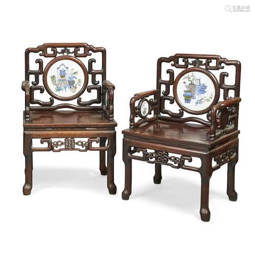 A pair of Chinese hongmu porcelain set armchairs,<br />
<br ...