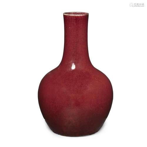 A Chinese red-glazed bottle vase<br />
<br />
Qing dynasty, ...