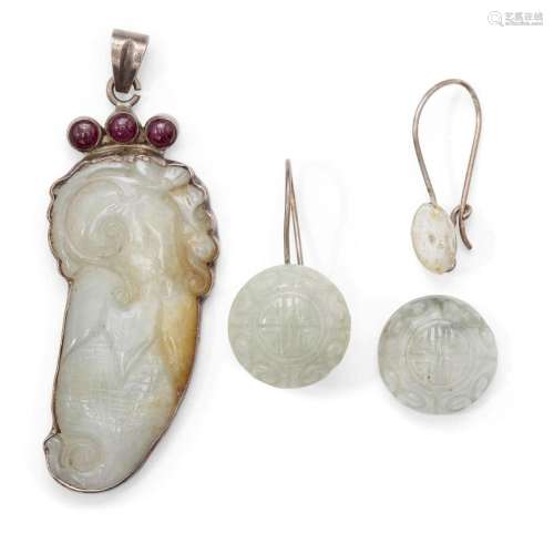 A Chinese pale green jadeite pendant and pair of jadeite ear...