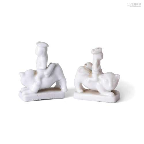A near pair of Chinese blanc-de-chine figurative whistles<br...