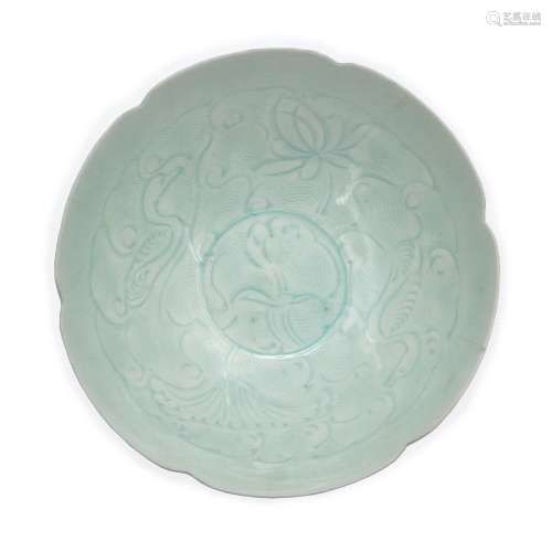 A Chinese qingbai-glazed 'ducks and lotus pond' carved bowl<...