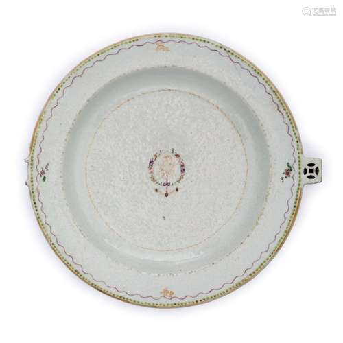 A Chinese export famille rose warming plate<br />
<br />
Qin...