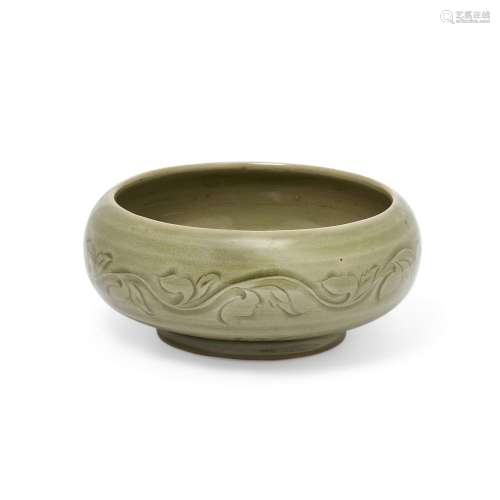 A Chinese Yaozhou-style celadon-glazed shallow bowl<br />
<b...