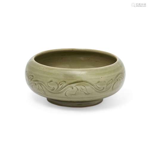 A Chinese Yaozhou-style celadon-glazed shallow bowl<br />
<b...