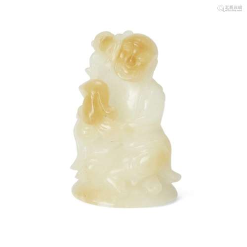 A Chinese white and russet jade finial <br />
<br />
20th ce...