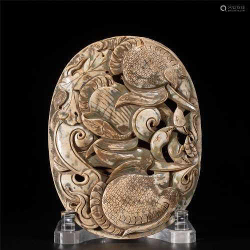 A CARVED ARCHAIC JADE PLAQUE PANDANT