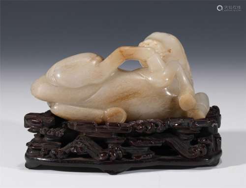 A CHINESE CARVED JADE HORSE