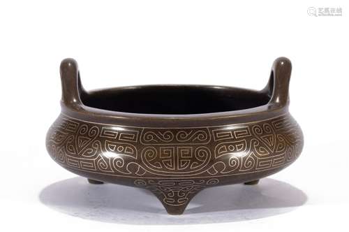 A BRONZE TRIPOD CENSER