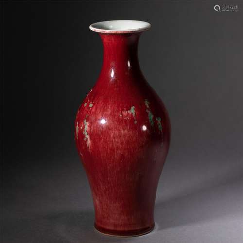 A RED GLAZED PORCELAIN VASE