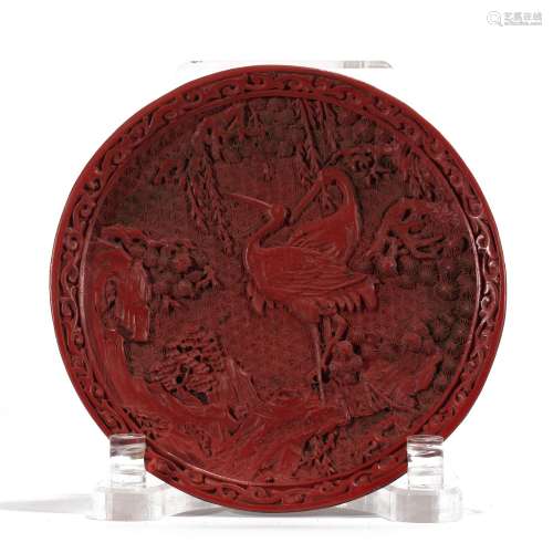 A CARVED CINNABAR LACQUER CRANEDS PLATE