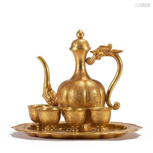 A SET OF GILT BRONZE WINEPOT AND CUPS