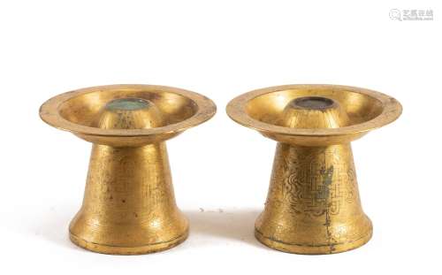 A PAIR OF GILT BRONZE CANDLE HOLDERS