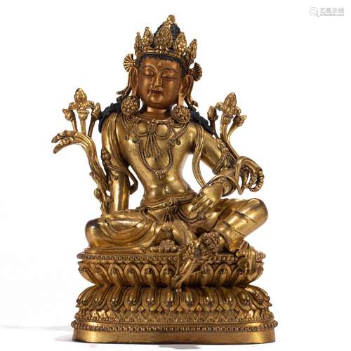 A GILT BRONZE SEATED FIGURE OF BUDDHA